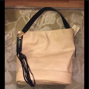 Super cute! Tan/Beige and Black Hobo Bag
